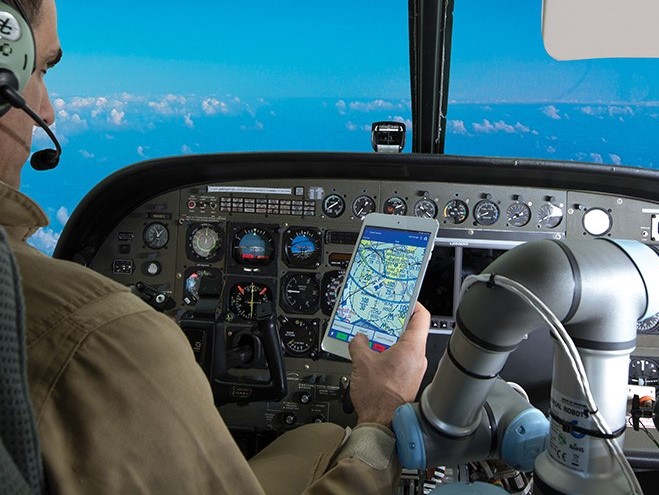 From the Vault  -  Robotic  Co-pilot  made by  Boeing  subsidiary  Flies  and  Lands  Boeing  B737  simulator  - Year 2017 .